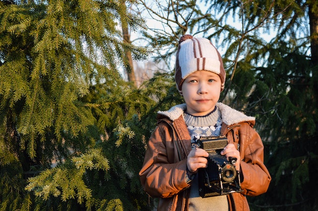 Child practicing mindfulness through photo walks