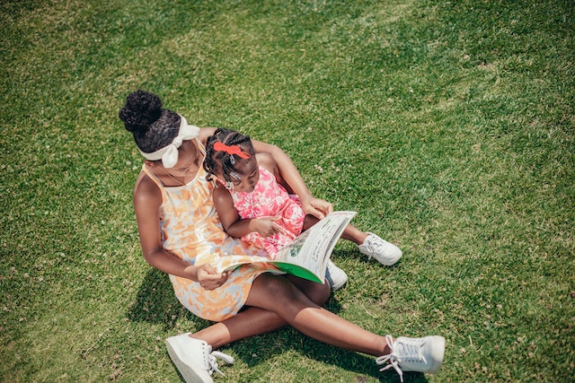 Children reading in the spring