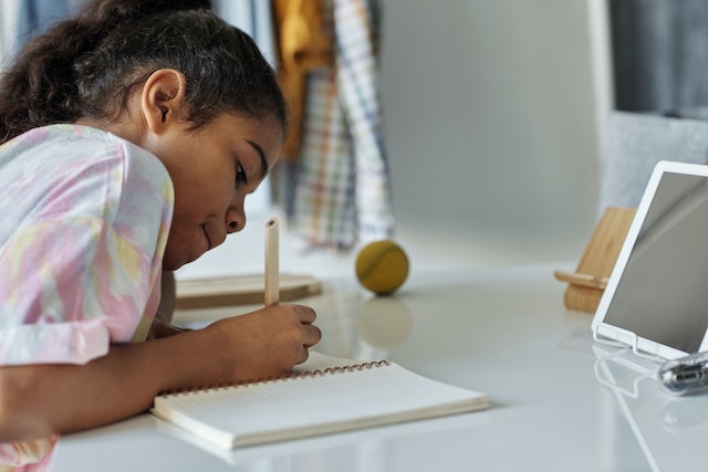 Child practicing writing skills