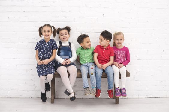 Group of children sitting on a bench