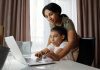 Parent using technology during homeschooling
