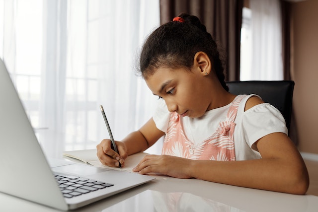 Child working on homeschool assignment