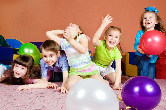 Kids playing with balloons