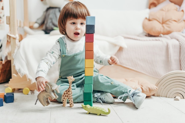 Young child playing with blocks
