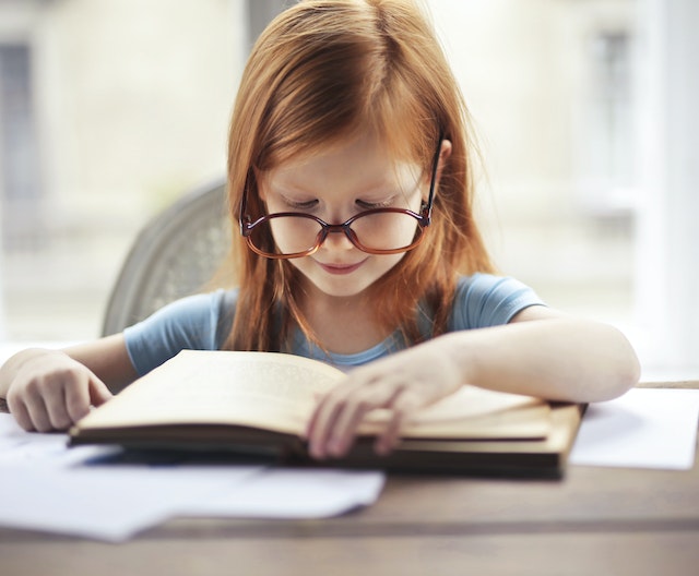 Child reading a book