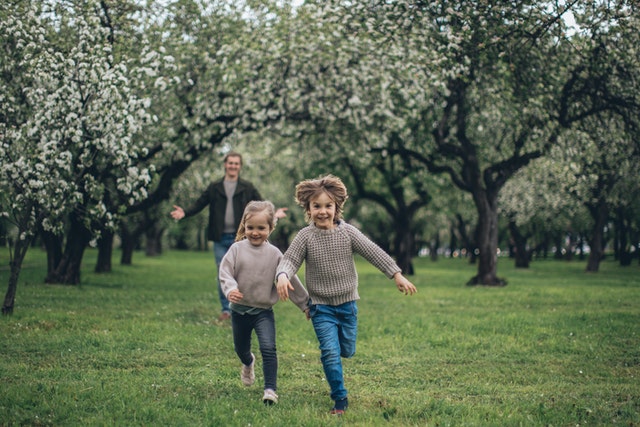 Children running on grass Spring activities for preschoolers Children running on grass in summers