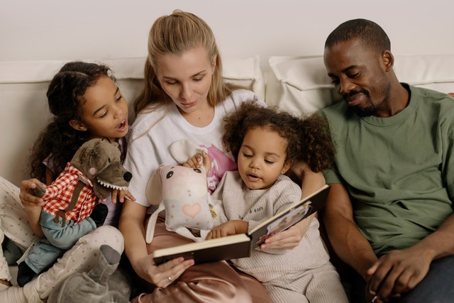 Family reading mom poems together