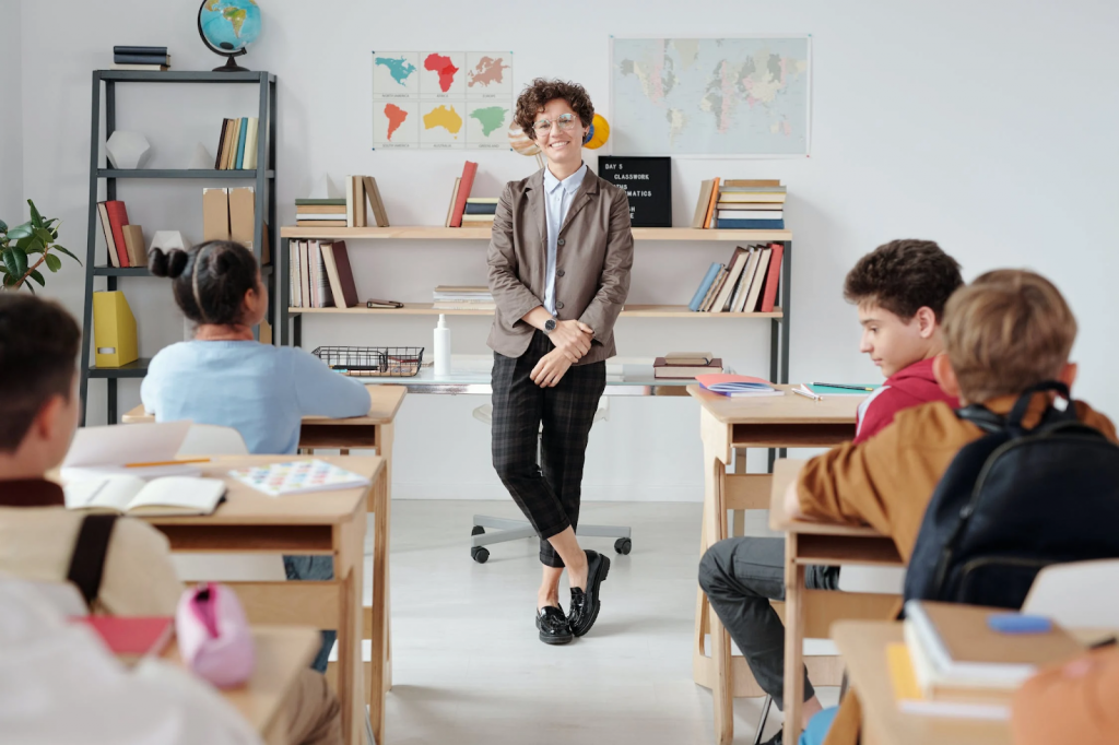 A teacher standing in the classroom