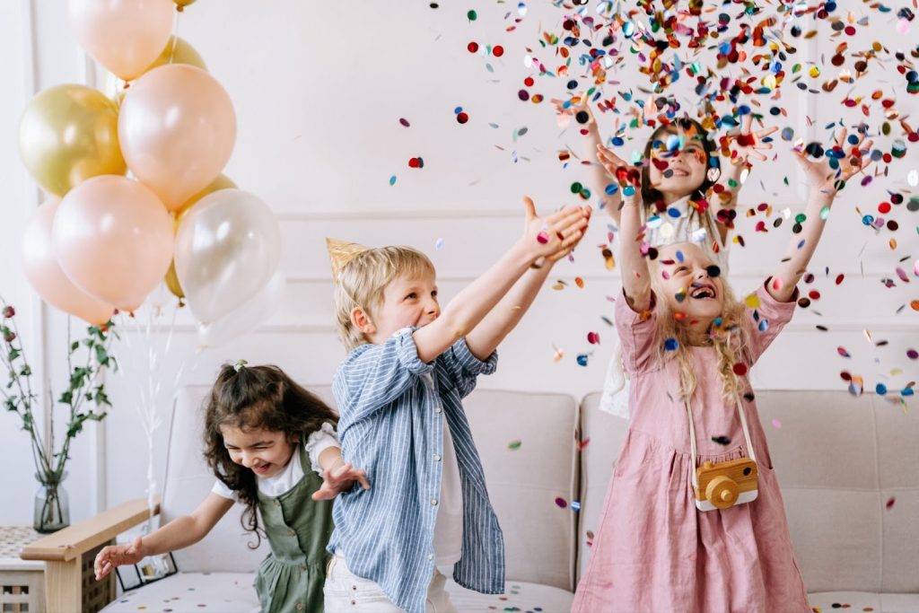 Kids play with confetti