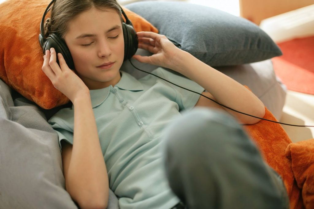 Girl listening to podcast