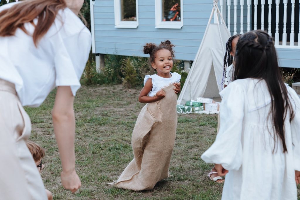 Young girl participates in a sack race