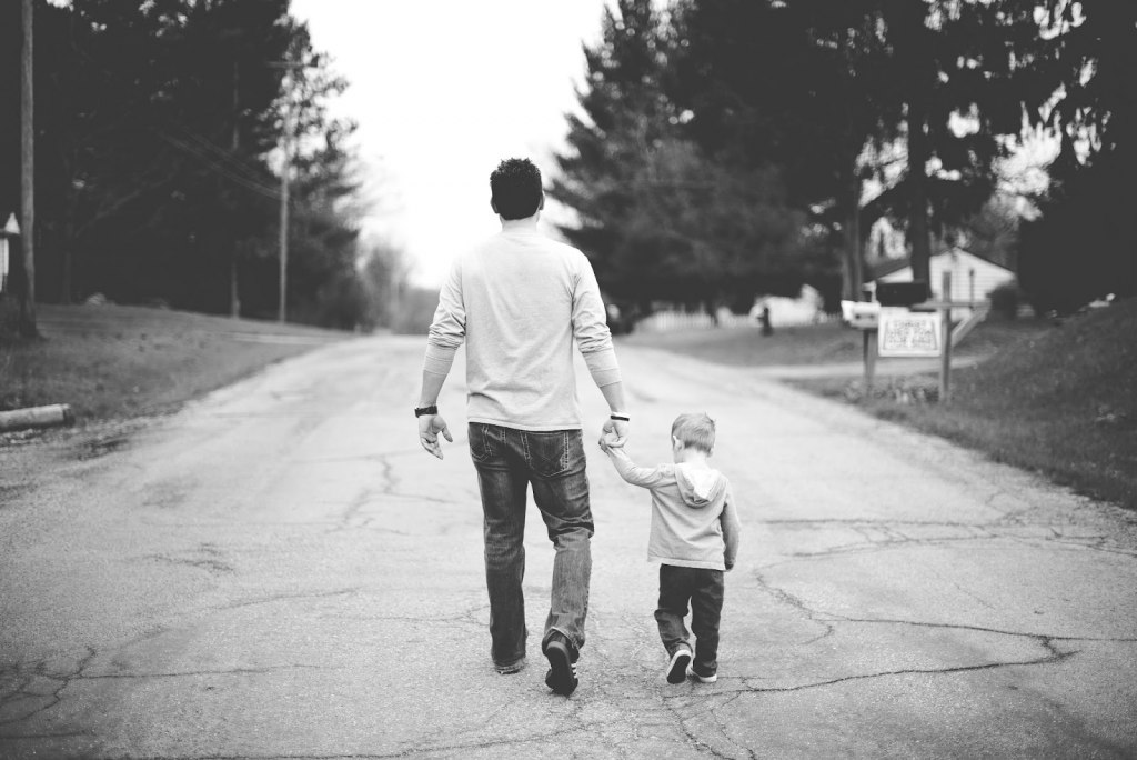 Father walking with his son