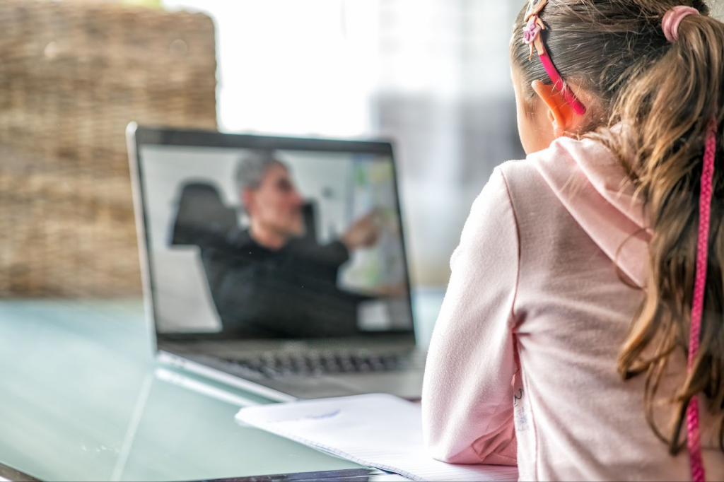 Girl watching a video on laptop