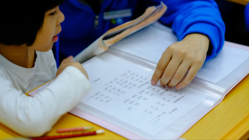 Asian girl studying at home