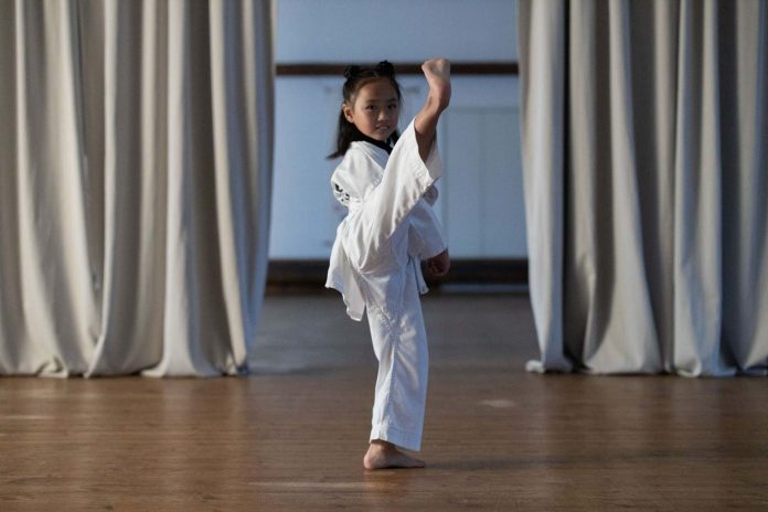 Girl Practicing High Kick