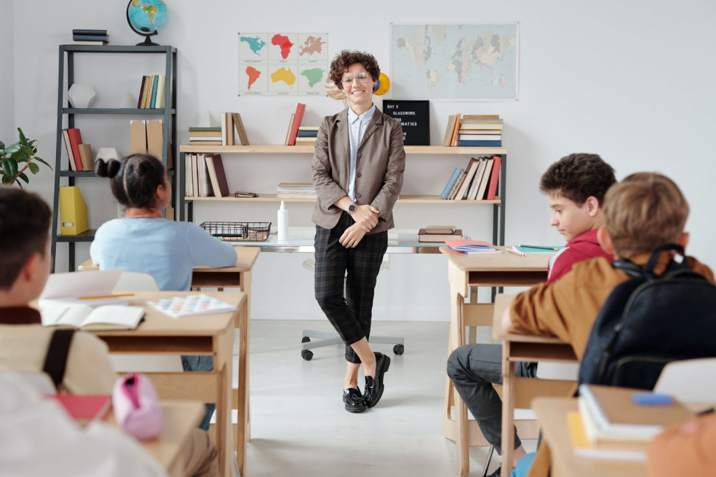 A Teacher Standing in the Classroom