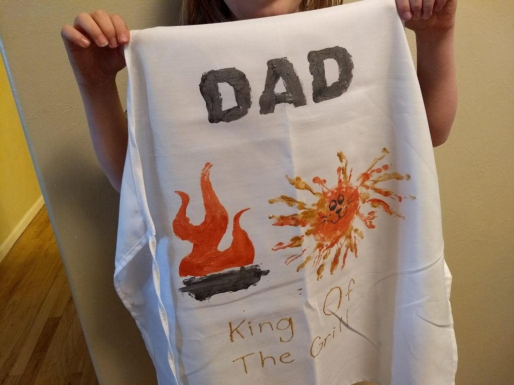 DIY apron with DAD King of the Grill on it