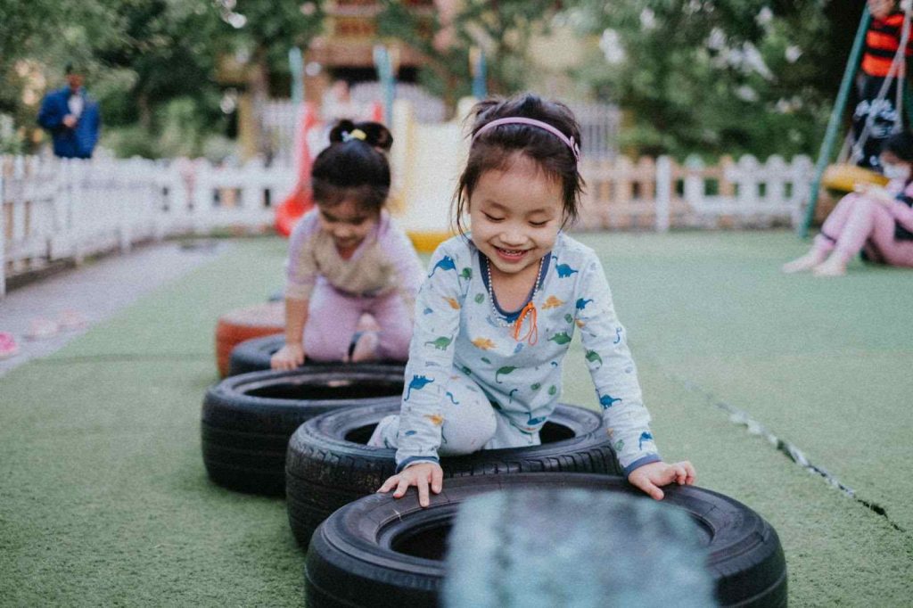 Girls Playing With Tyres