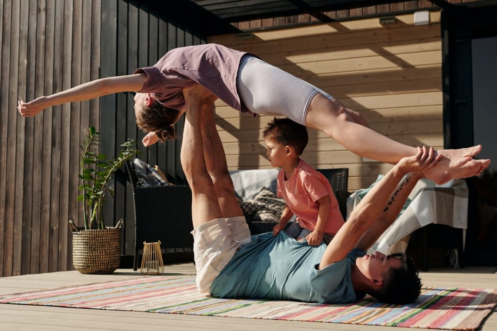 Father exercising with his kids