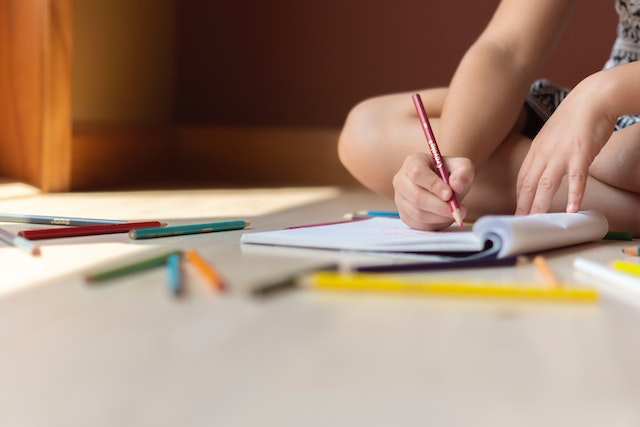 Child working on funny writing prompts