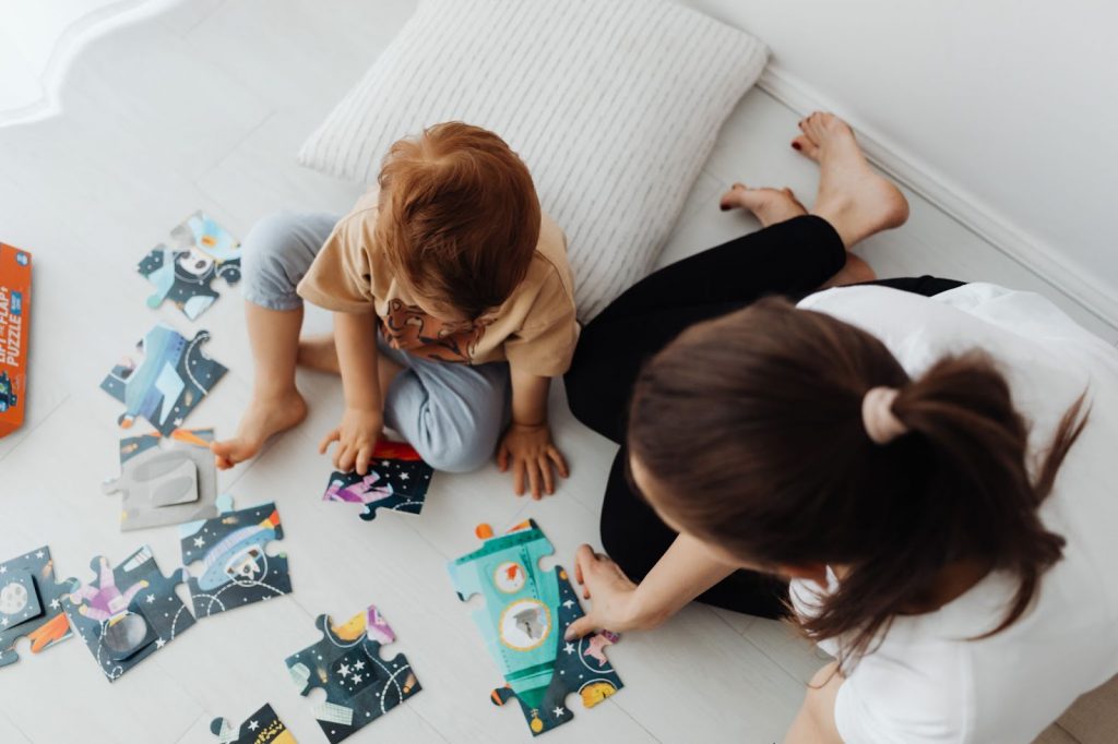 Kids completing Jigsaw Puzzle