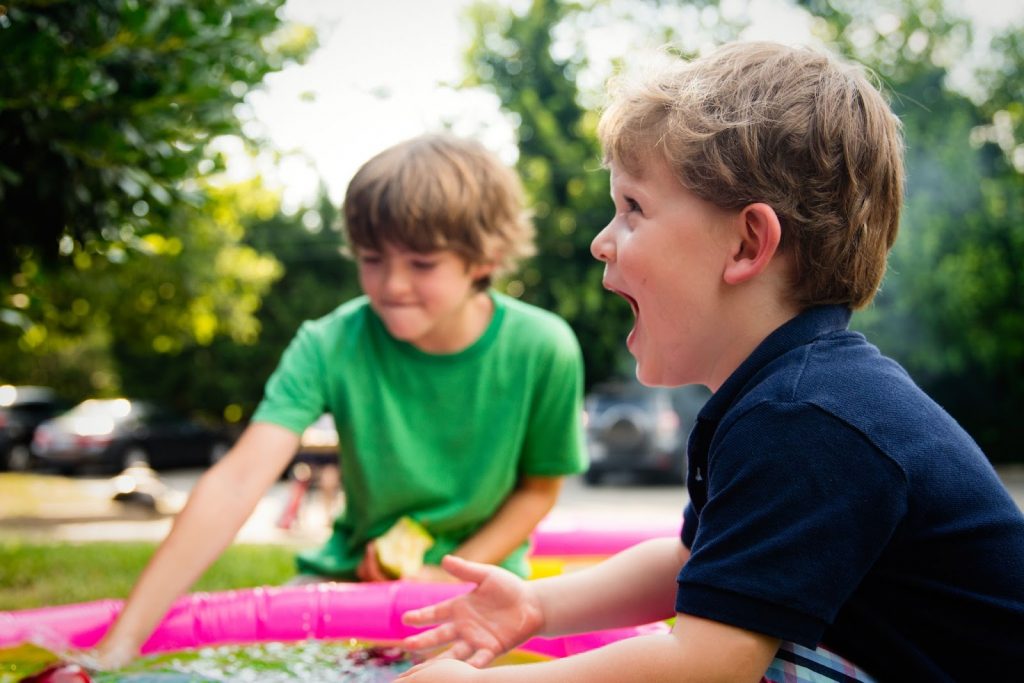 Little boys playing outdoors