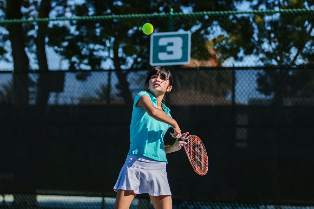 Girl playing tennis