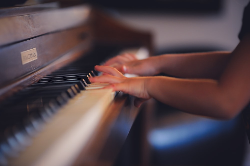 A kid playing piano