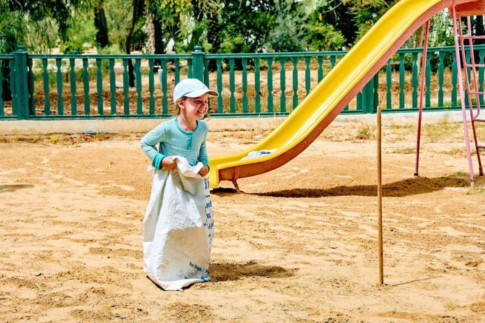 A Girl Playing in the Playground