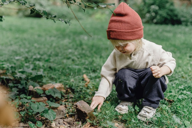 Child interacting with nature