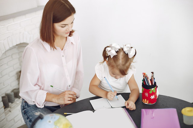 Mother and child homeschooling