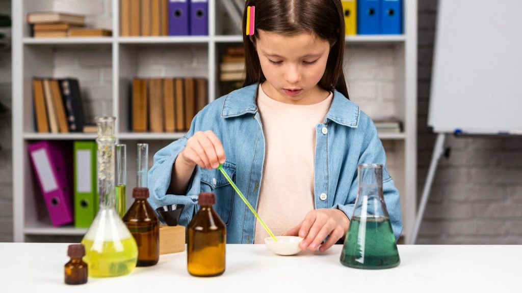 A girl doing science experiment