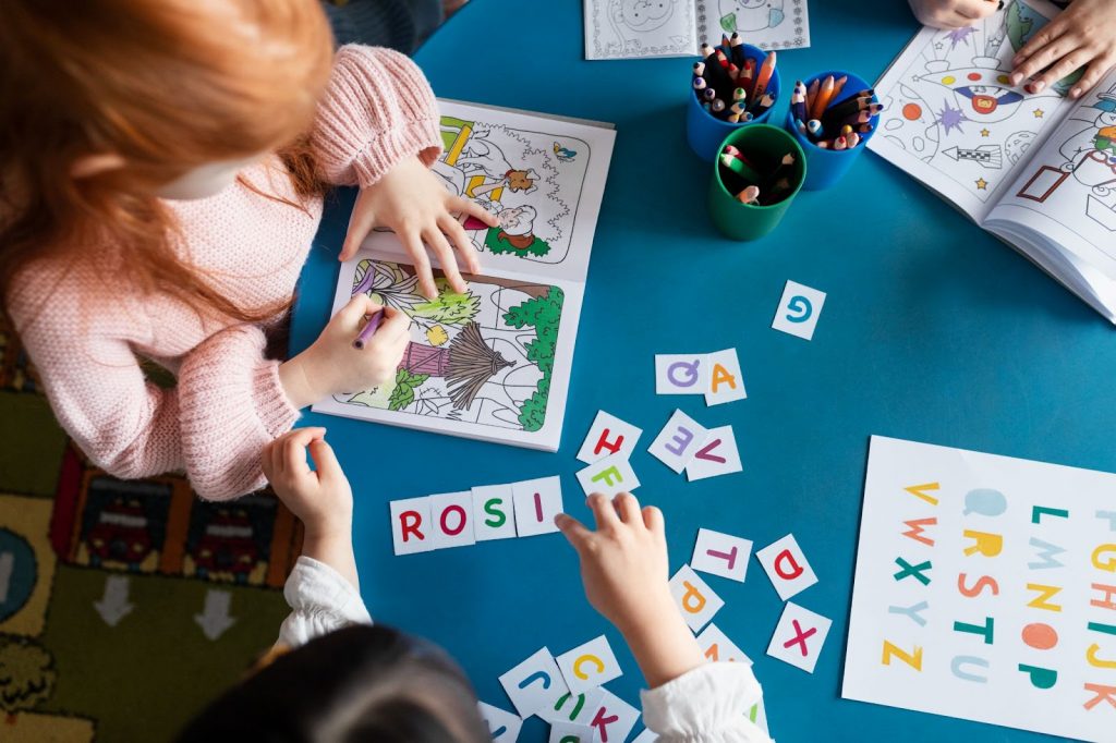 Kids arranging letters