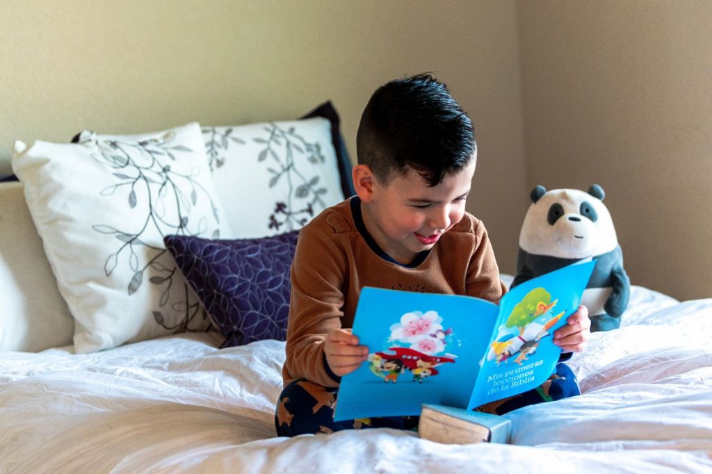 Kid reading a book