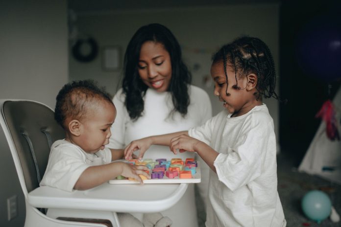 Mother playing with her kids