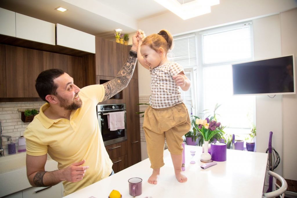 Father cheering his daughter