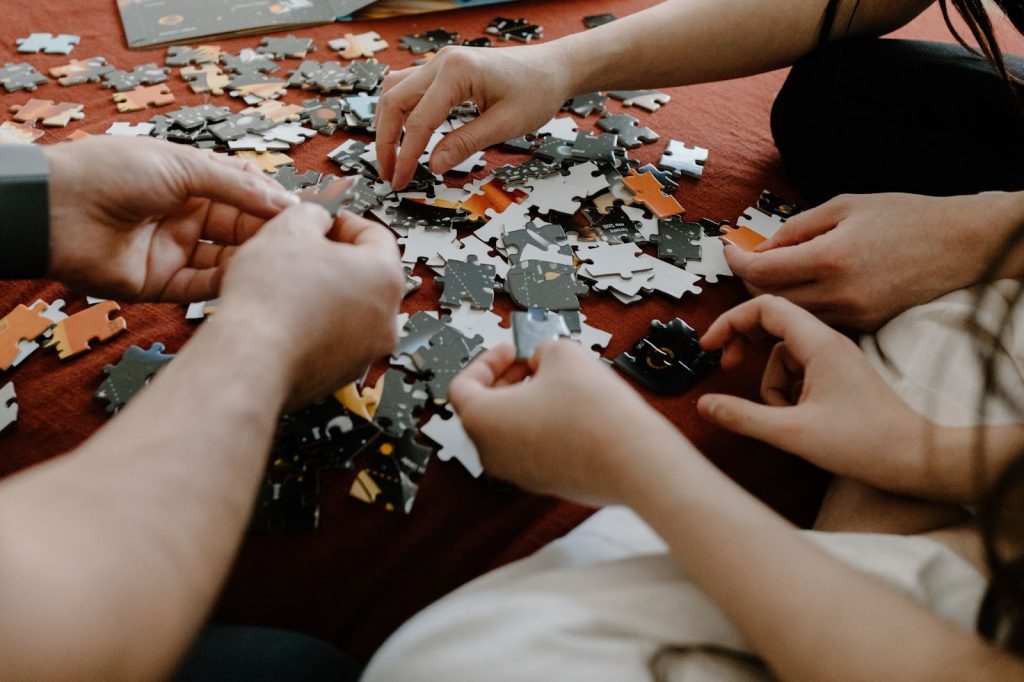 Children playing with jigsaw puzzles