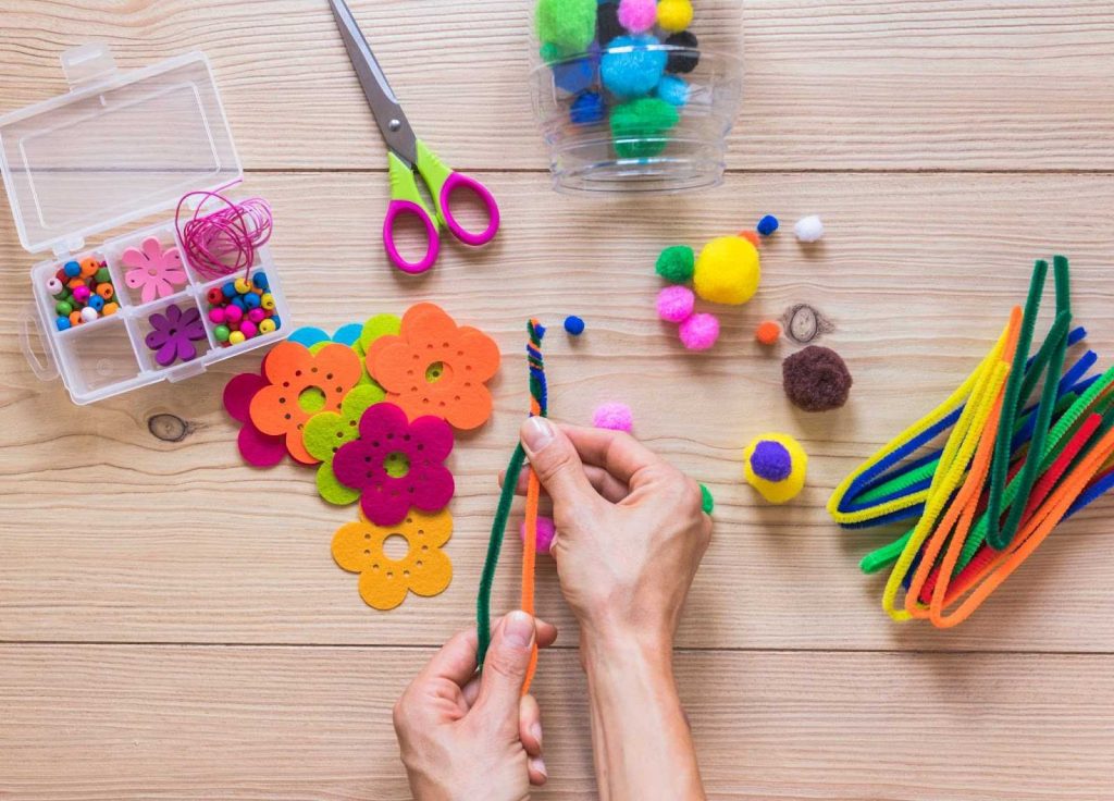 A person making handmade craft material