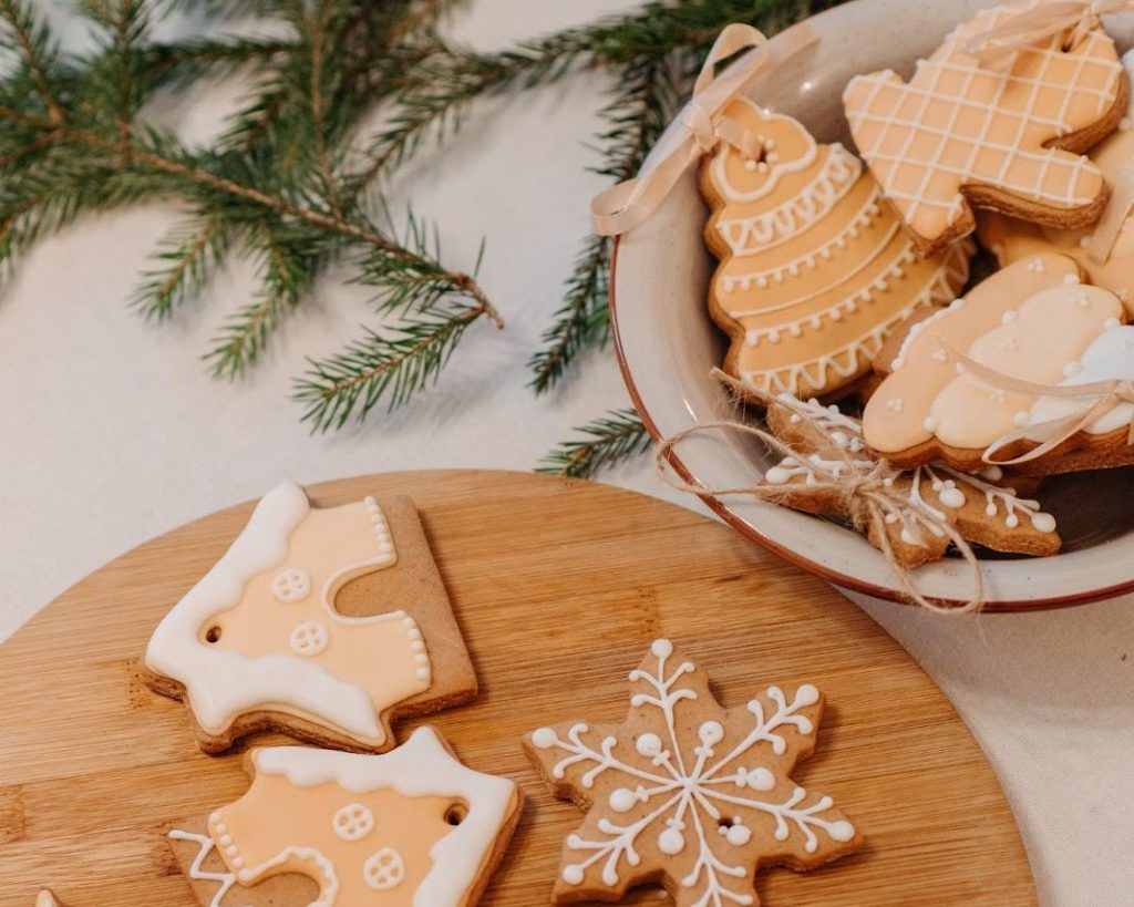 Christmas cookies of different shapes and sizes on a table