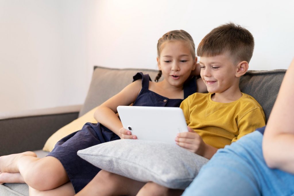 Kids watching videos on tablet