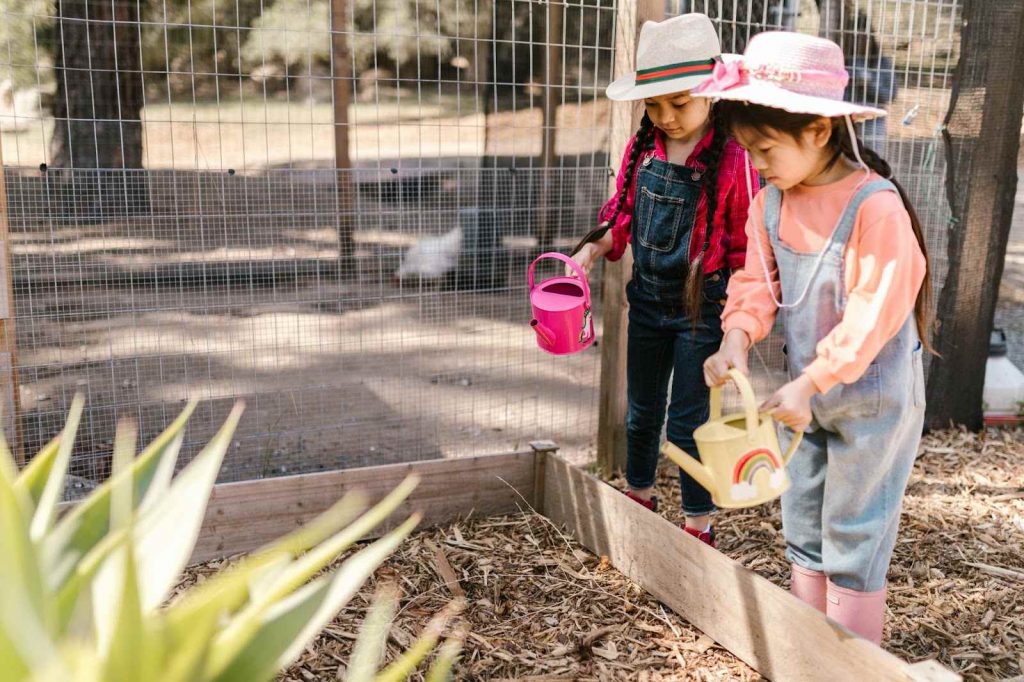 Two kids gardening