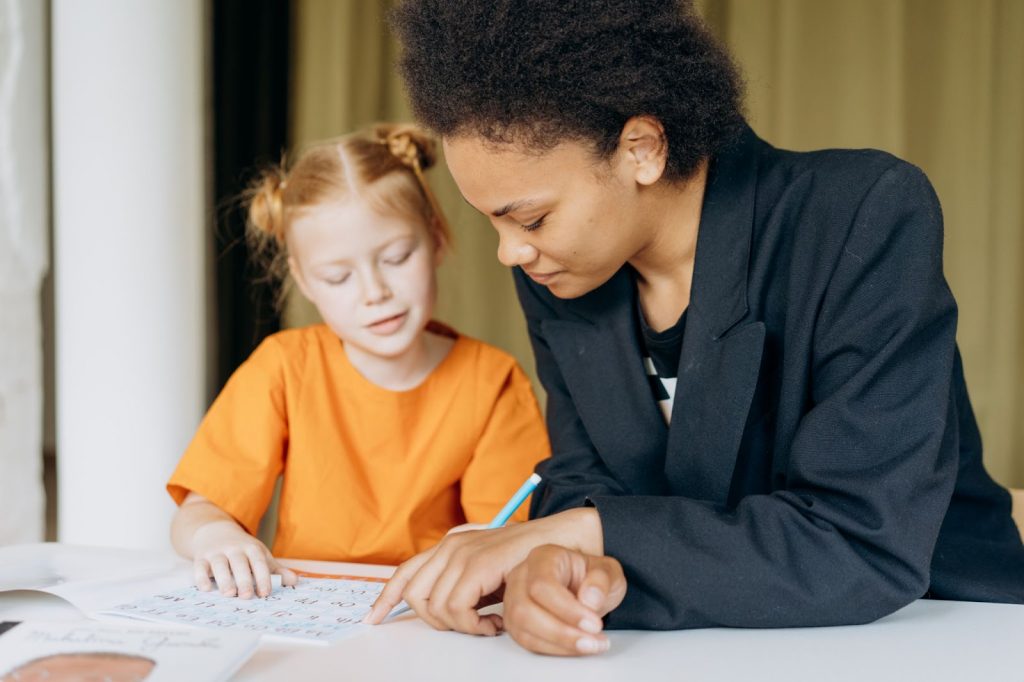 A mother teaching her daughter