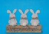 55 Best Bunny Crafts Ideas for Kids to Try This Easter 3 wooden bunny figures on a wooden cuboid