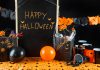 Happy Halloween written on a board