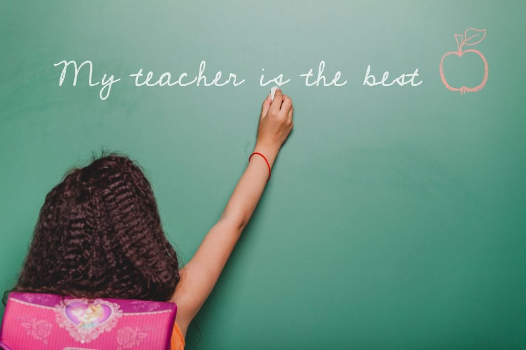 “my teacher is the best” written on board