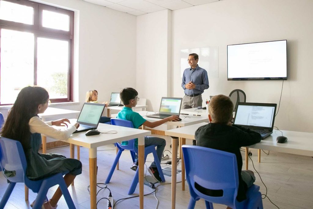 Teacher teaching in class