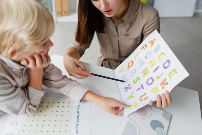 Kid learning letters