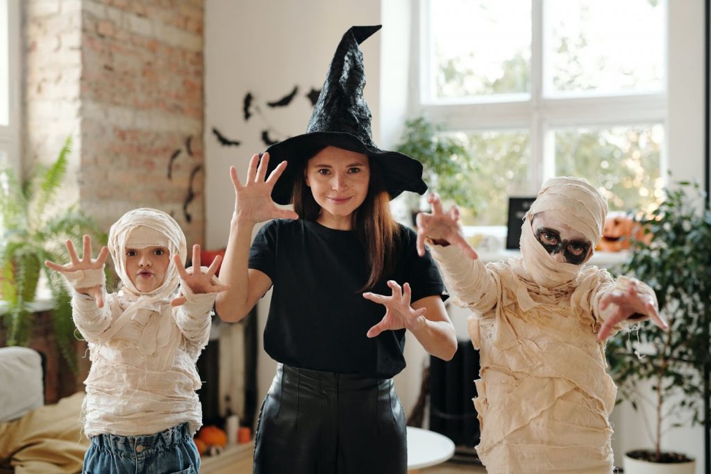 Kids dressed as witches mummies for Halloween