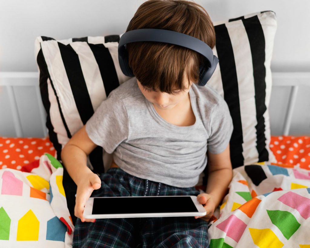 Kid playing on device