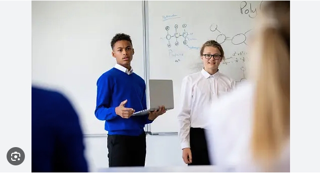 Two children giving a presentation together